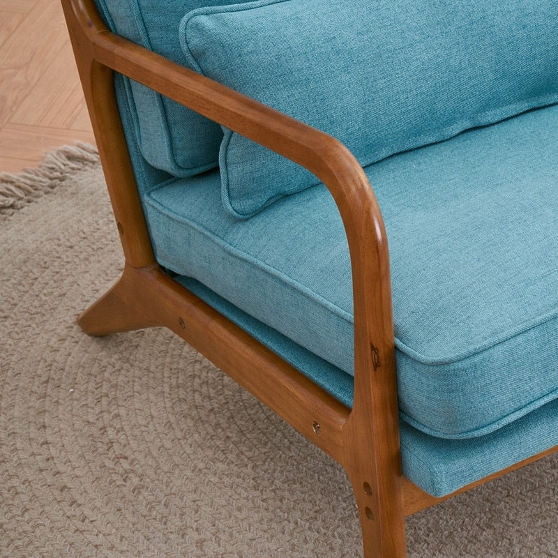 Gestoffeerde accentstoel in midcenturymoderne stijl